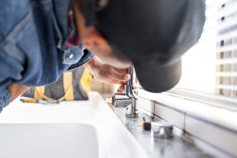 Nashville Plumbing - plumber fixing faucet